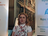 Ирина Шухаева выступает на пресс-завтраке. Июль 2015.